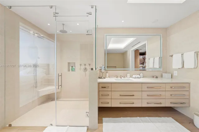 a bathroom with a double vanity sink mirror and double