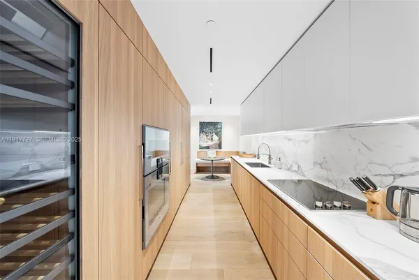 a hallway with cabinets