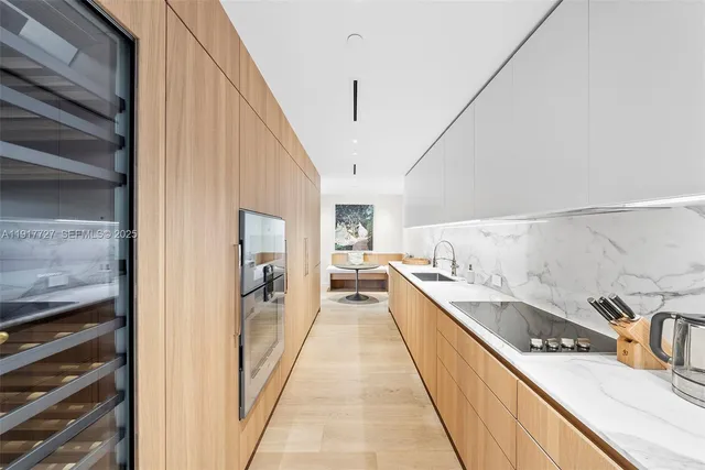a hallway with cabinets