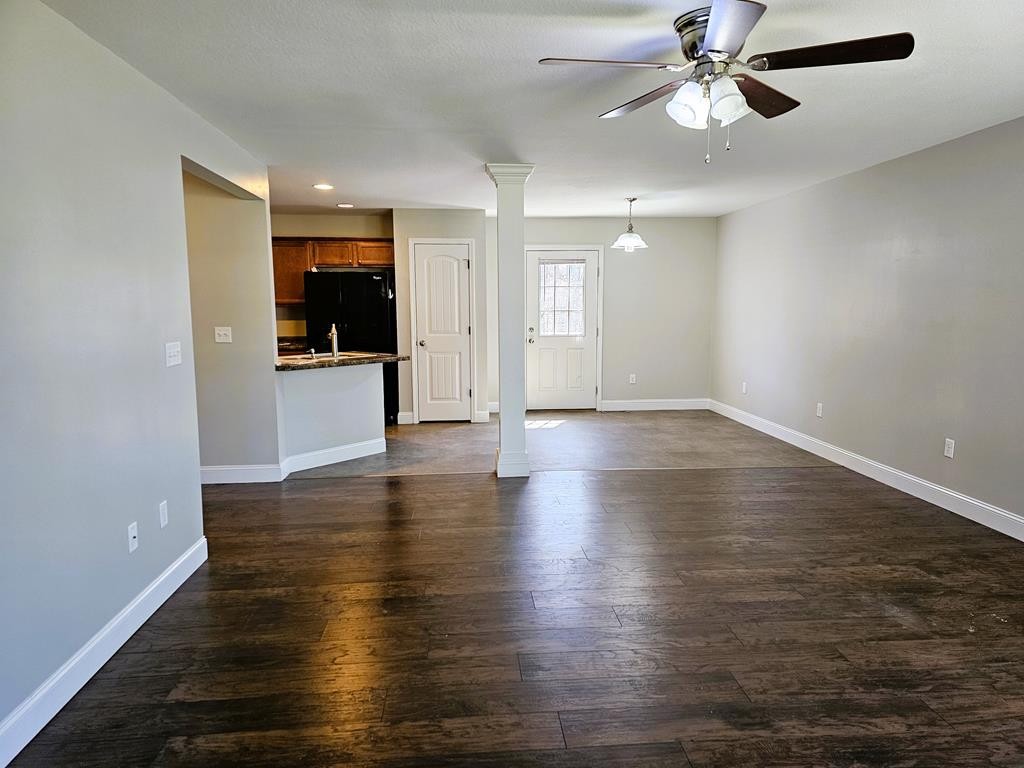 4835 Cameron Road Morristown, TN 37814 - Photo 3 of 25 a view of an empty room with window and wooden floor