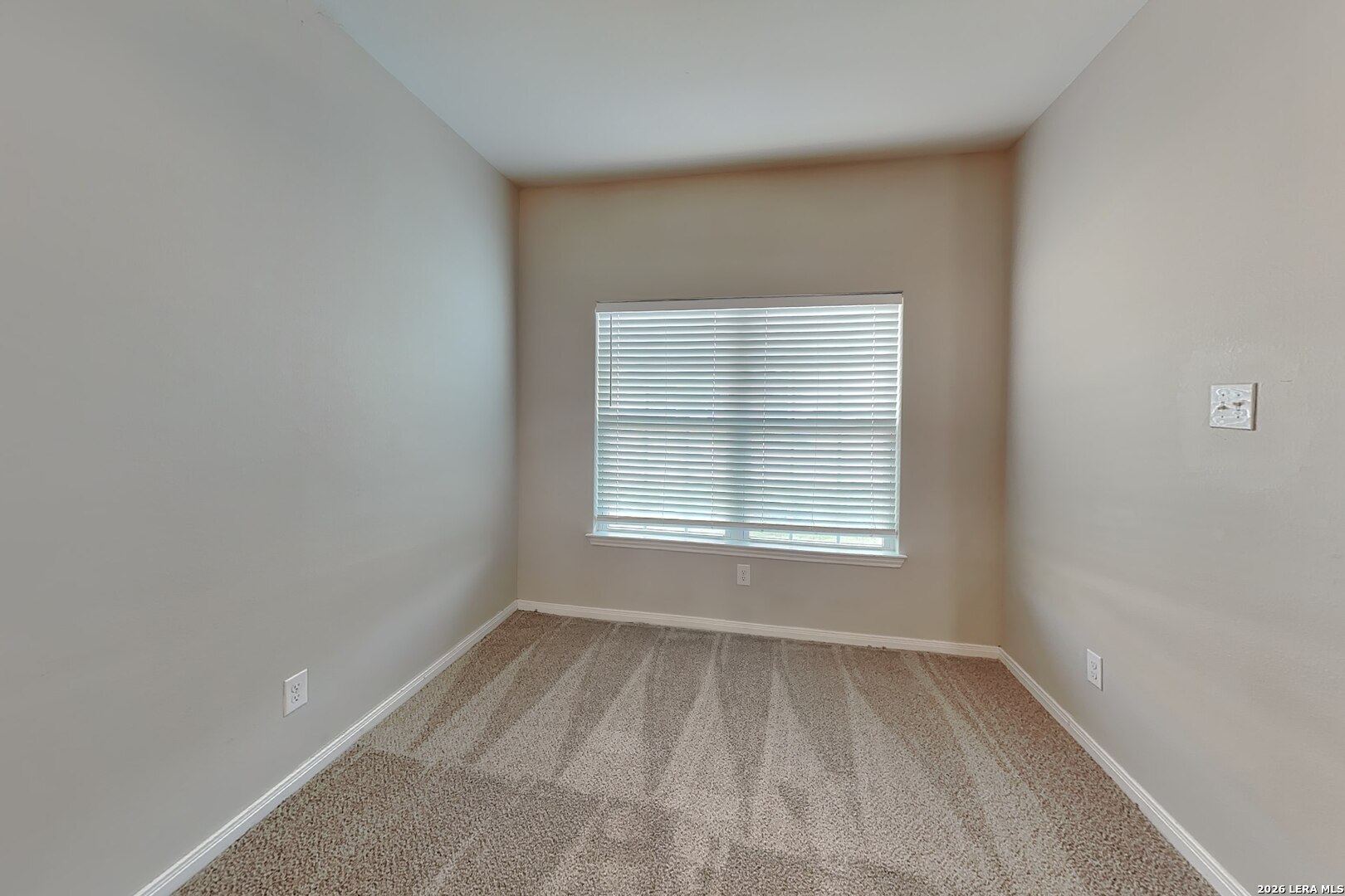 3022 Citron Garden Converse, TX 78109 - Photo 2 of 21 an empty room with a window