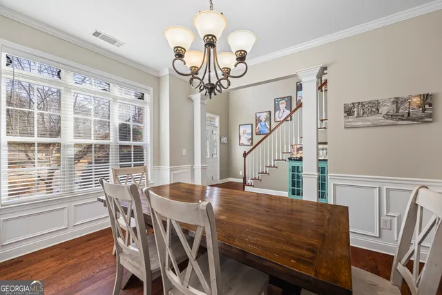 a kitchen with stainless steel appliances granite countertop a stove a sink dishwasher and a refrigerator