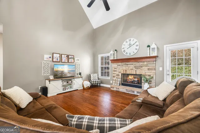 a kitchen with a refrigerator and a stove