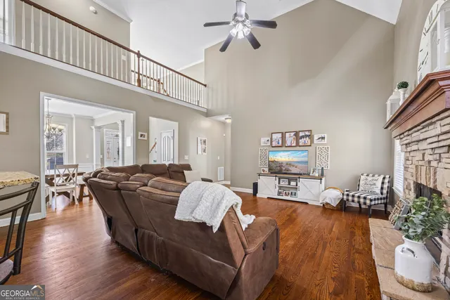 a spacious bedroom with a bed and a book shelf