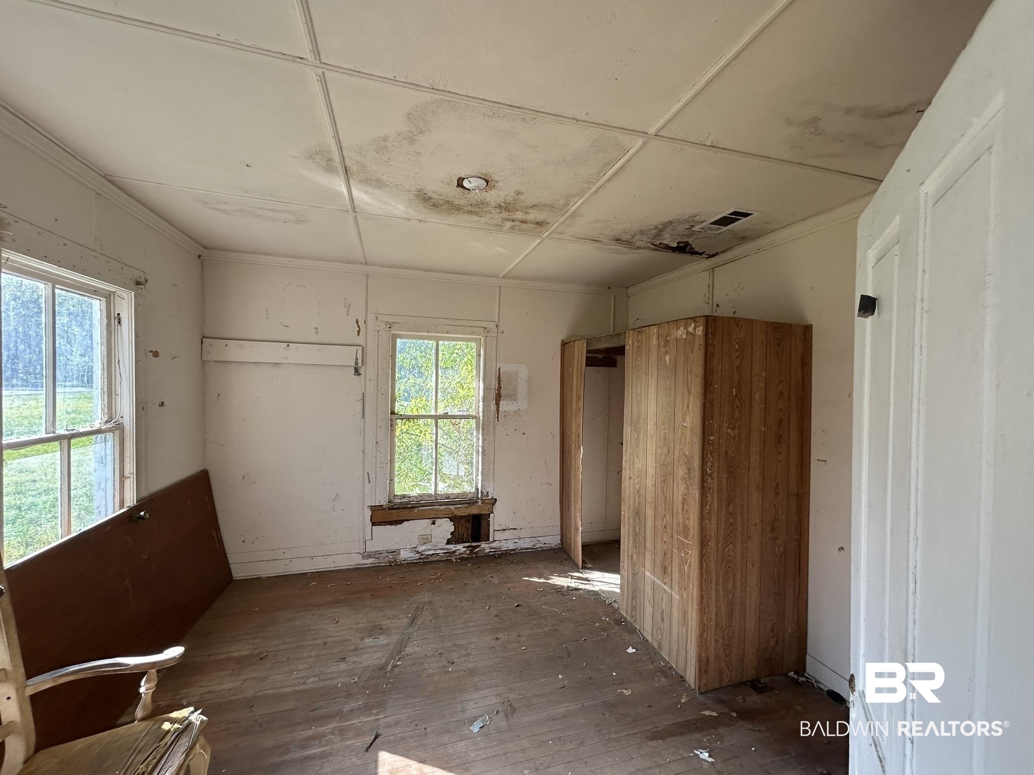 3142 West Turner Road Mobile, AL 36612 - Photo 18 of 19 Miscellaneous room with visible vents and hardwood / wood-style flooring