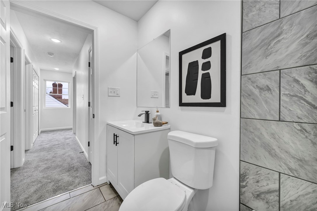 3734 Pennington Road Cleveland, OH 44120 - Photo 25 of 45 Bathroom featuring vanity, light carpet, and recessed lighting