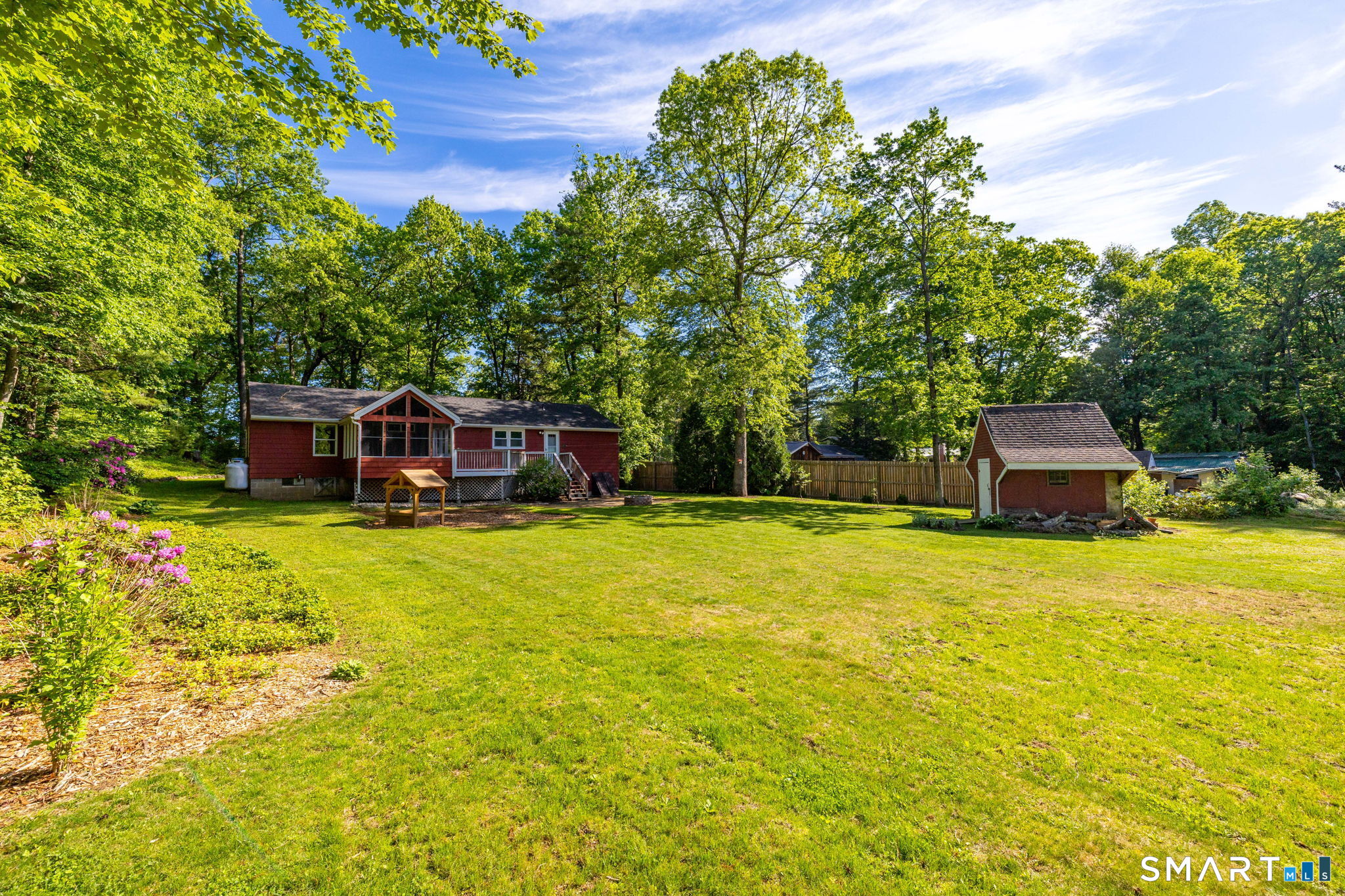 347 Griffin Road Suffield, CT 06093 - Photo 29 of 35 a small pool with a big yard and large trees