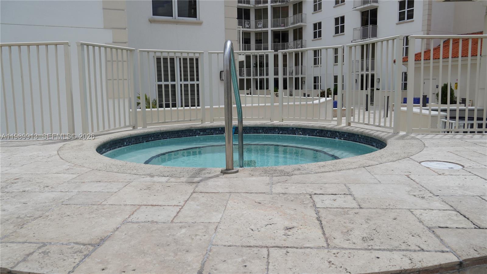 2030 Douglas Road, Unit 414 Coral Gables, FL 33134 - Photo 12 of 15 a view of outdoor space with swimming pool
