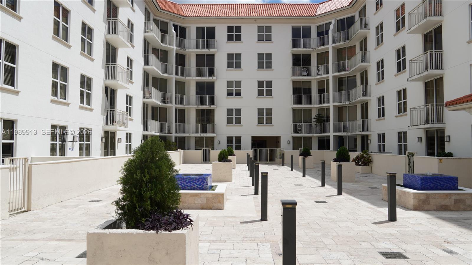 2030 Douglas Road, Unit 414 Coral Gables, FL 33134 - Photo 14 of 15 a view of tall buildings