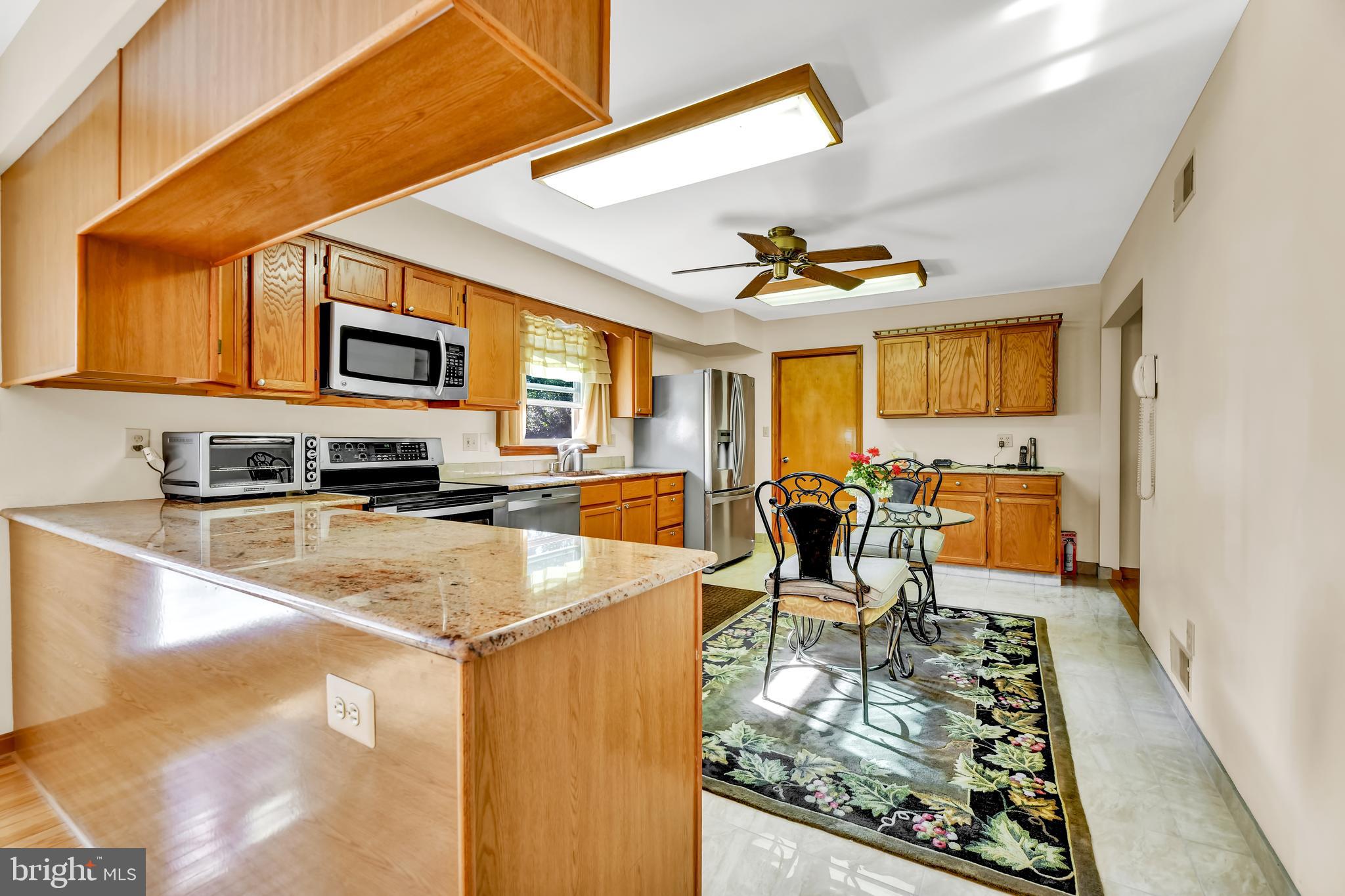 4565-10 Ten Oaks Road Dayton, MD 21036 - Photo 7 of 39 Granite counters and updated appliances