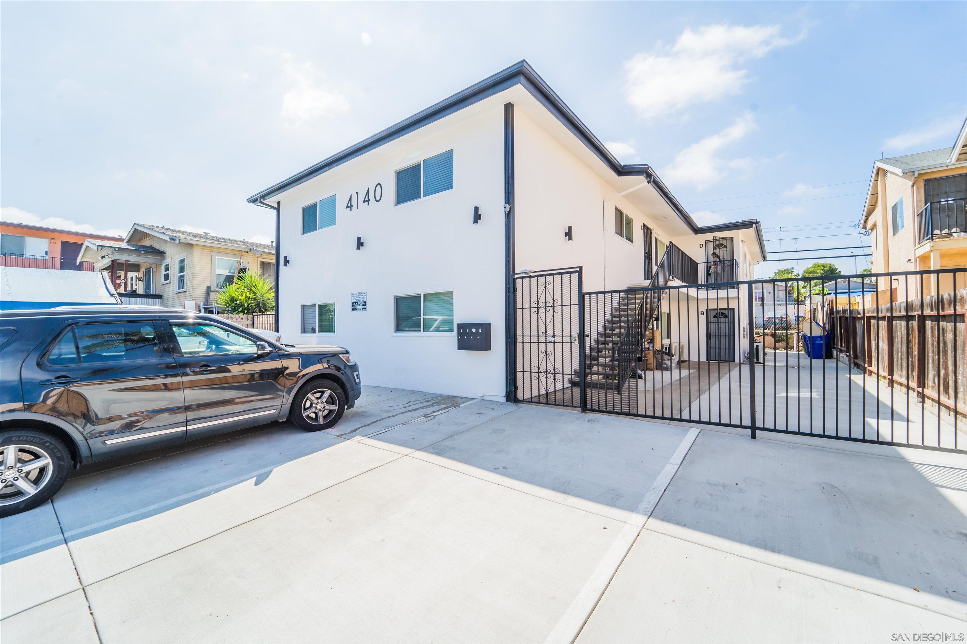 4140 48th Street San Diego, CA 92105 - Photo 1 of 12 a view of a car parked in front of a house