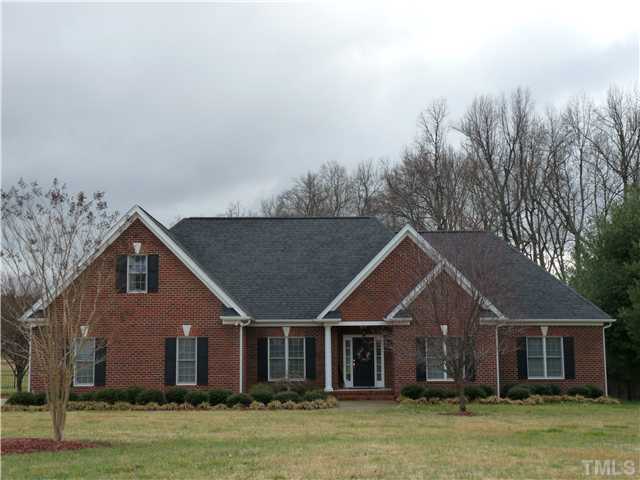 2178 Thee Hester Road Roxboro, NC 27574 - Photo 1 of 12 front view of a house with a yard