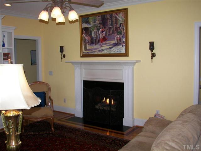 2178 Thee Hester Road Roxboro, NC 27574 - Photo 5 of 12 a living room with furniture and a fireplace