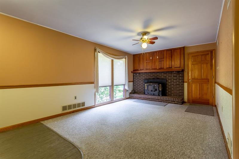 234 McKenzie Road Clinton, PA 15026 - Photo 11 of 24 Wood Burner is the Focal Point of the Family Room.
