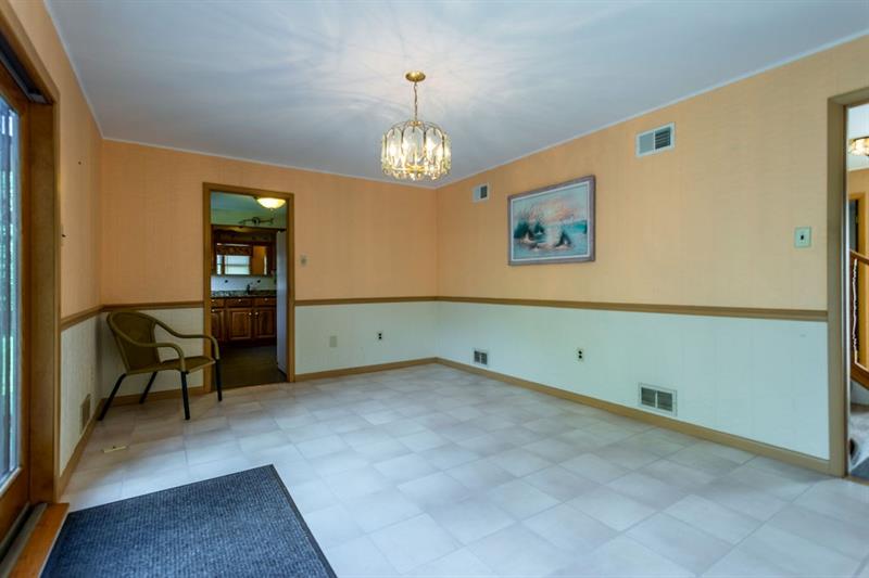 234 McKenzie Road Clinton, PA 15026 - Photo 13 of 24 Formal Dining Room Has Glass Slider to Huge Back Deck.