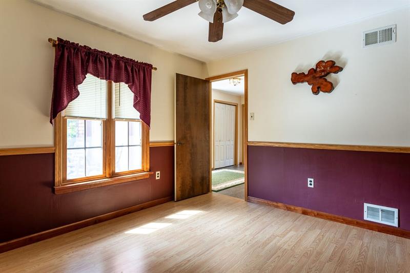 234 McKenzie Road Clinton, PA 15026 - Photo 16 of 24 Den on main floor w/ceiling fan.