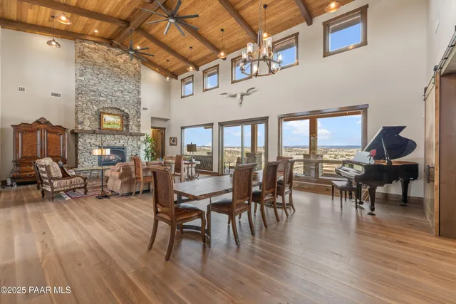 a bathroom with a toilet mirror and vanity