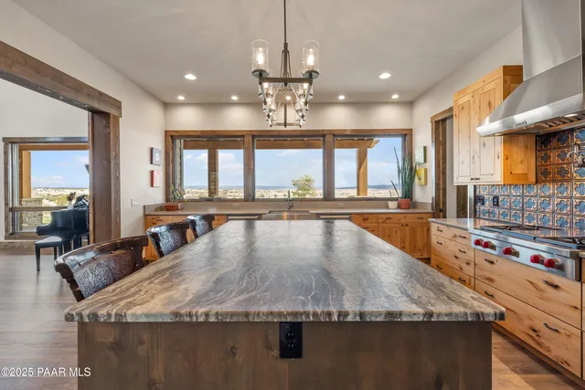 a bedroom with a bed and a fireplace