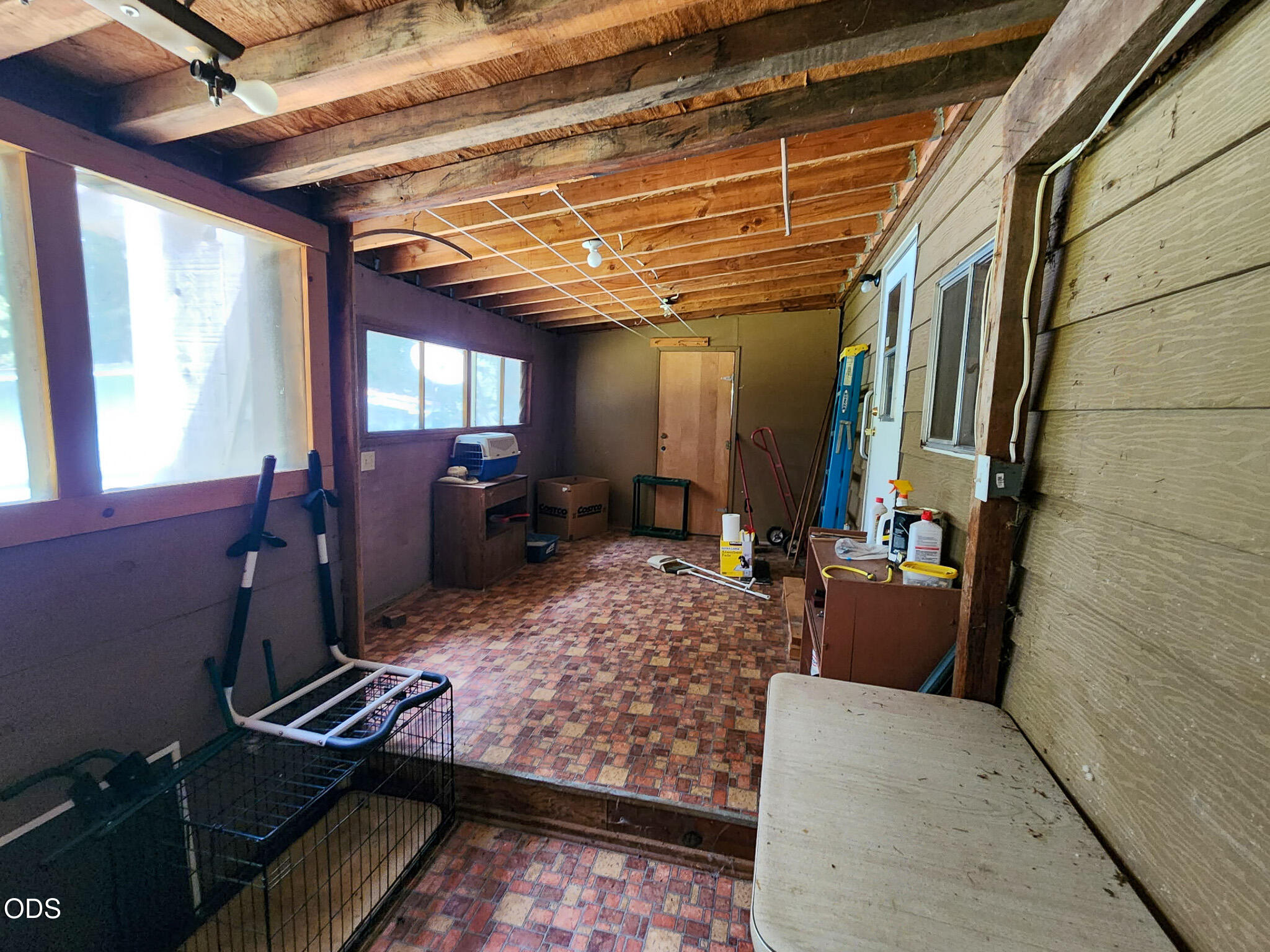 350 Hamilton Avenue Cave Junction, OR 97523 - Photo 31 of 34 a living room with furniture and a flat screen tv