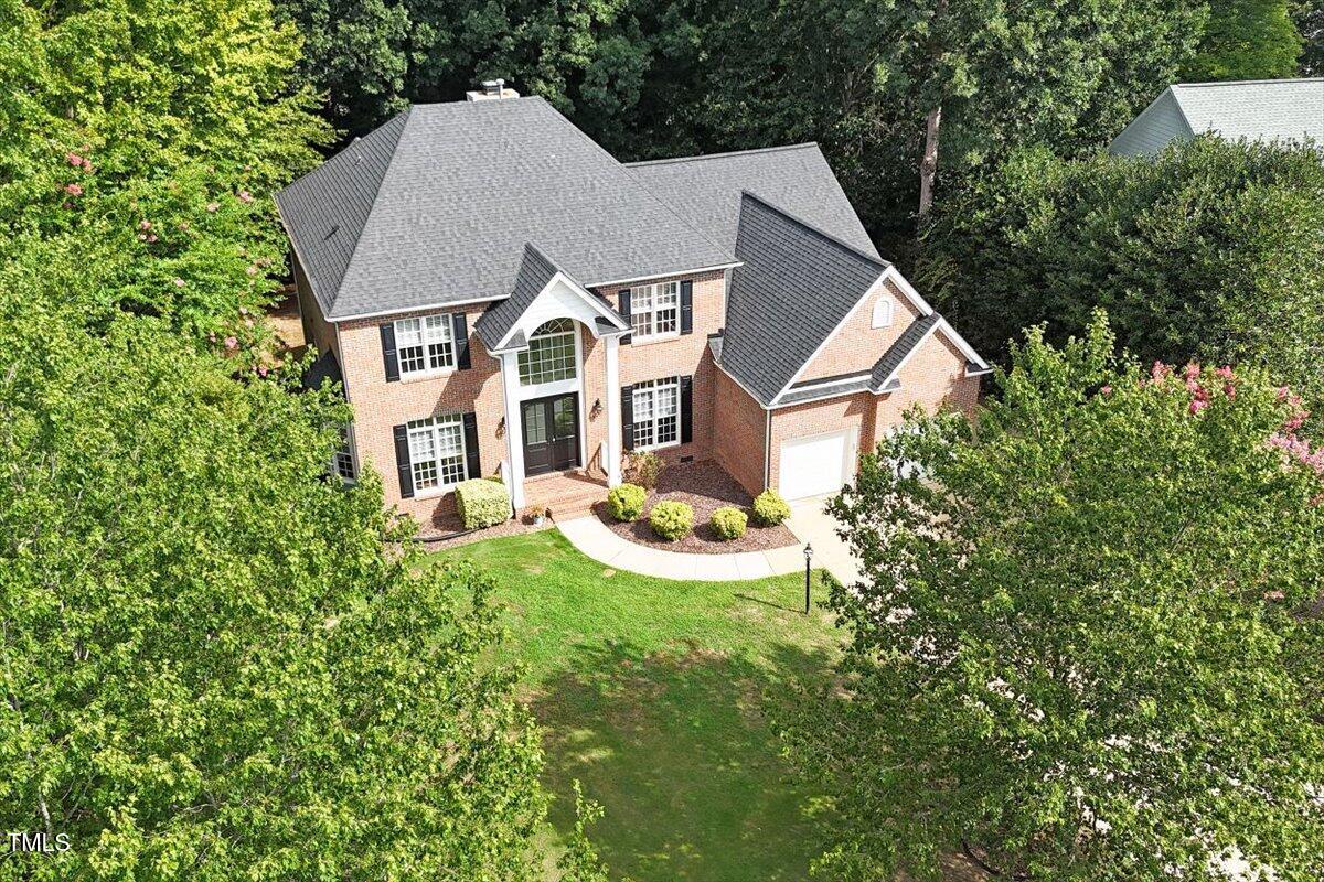 1913 Katesbridge Lane Raleigh, NC 27614 - Photo 34 of 38 a aerial view of a house with yard and green space