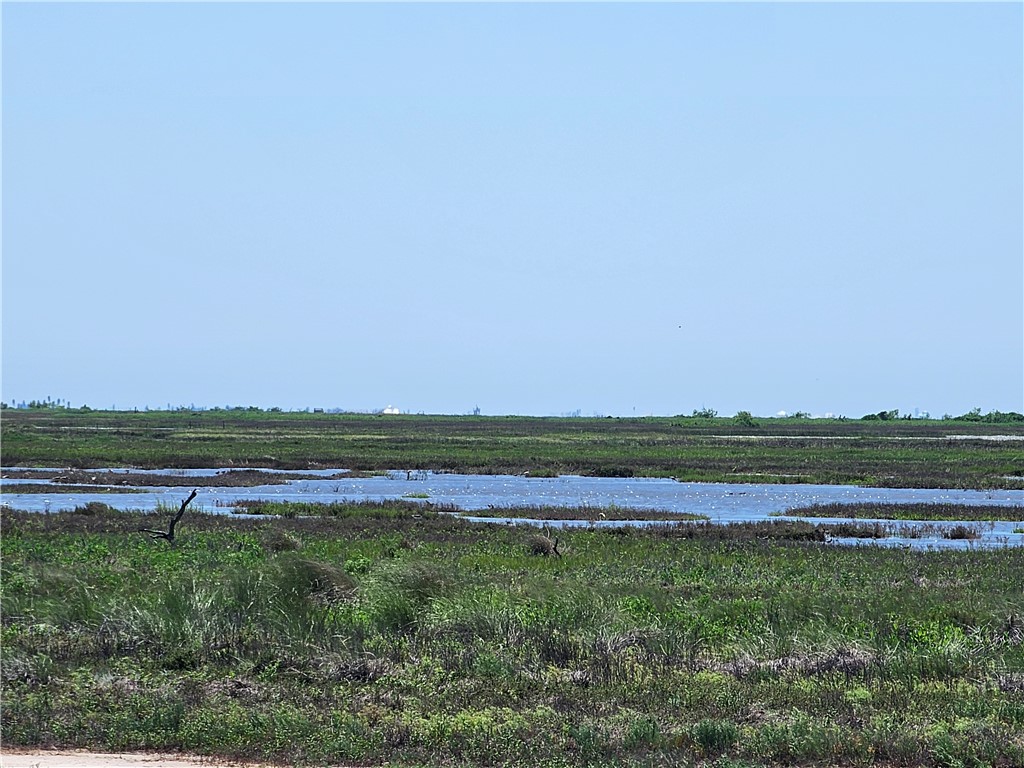 227 Palmetto Point Road Rockport, TX 78382 - Photo 1 of 10 a view of outdoor space with mountain view