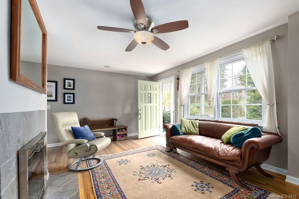 93 School Road Asheville, NC 28806 - Photo 2 of 24 a living room with furniture and a large window
