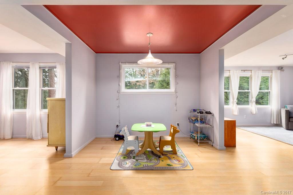 93 School Road Asheville, NC 28806 - Photo 16 of 24 a dining room with a table and chairs