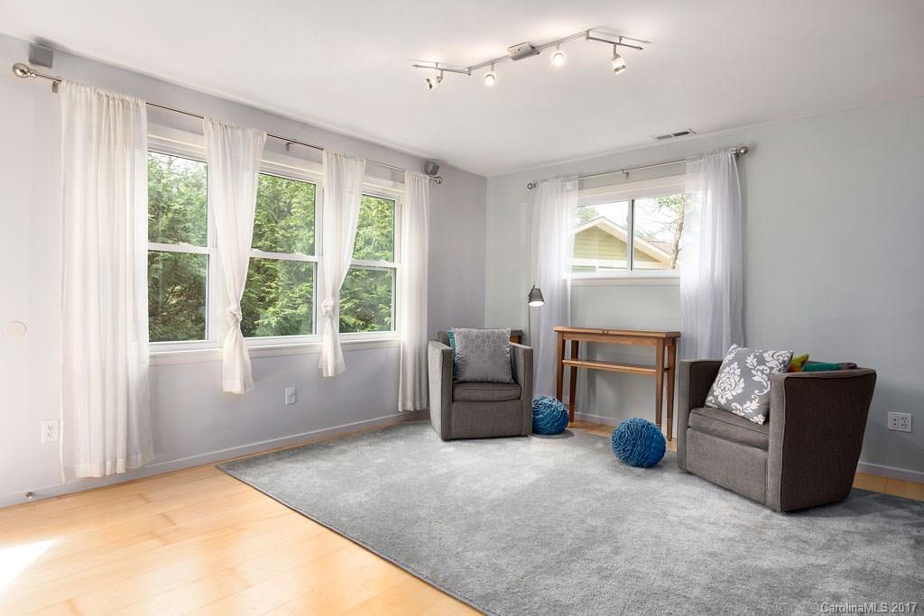 93 School Road Asheville, NC 28806 - Photo 19 of 24 a living room with furniture and a window
