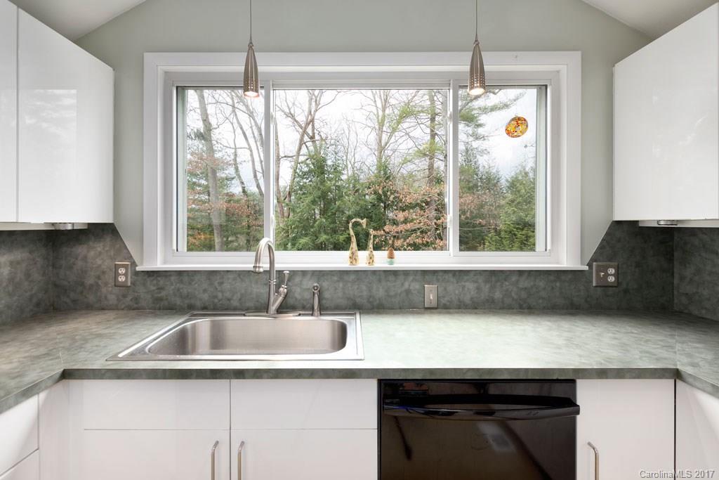 93 School Road Asheville, NC 28806 - Photo 6 of 24 a kitchen with a sink and a window