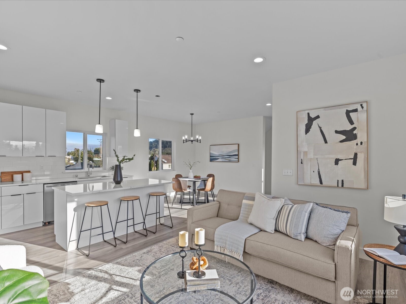 215 Corrin Avenue Northwest, Unit B Orting, WA 98360 - Photo 14 of 36 a view of kitchen with stainless steel appliances kitchen island granite countertop a living room