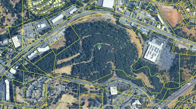 a view of swimming pool and mountain view in back