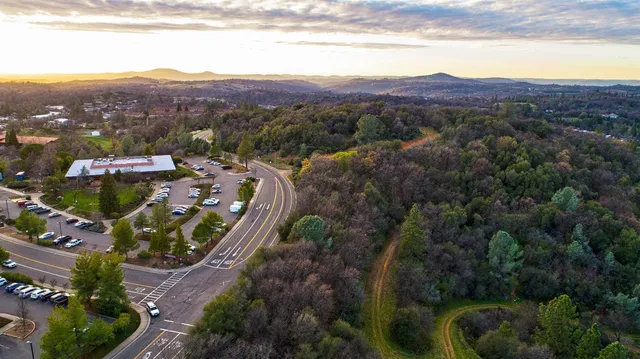 a view of a city with mountains in the background
