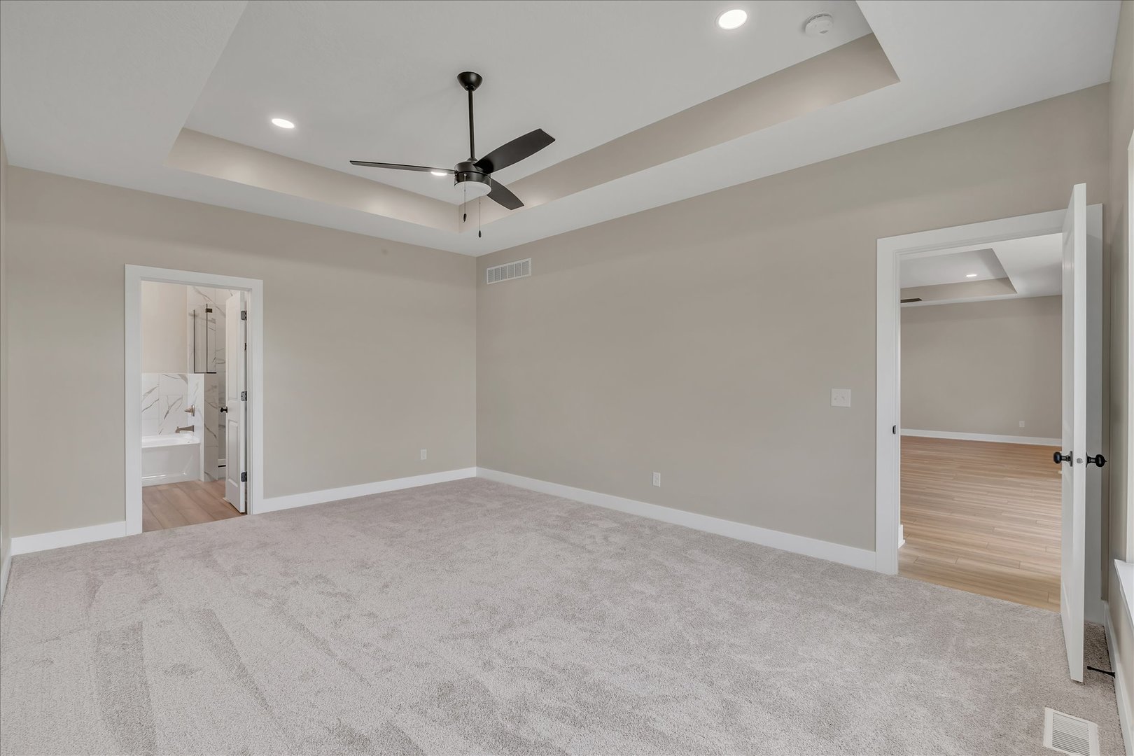 455 Rhonda Road New Liberty, IA 52765 - Photo 31 of 54 a view of an empty room and a ceiling fan