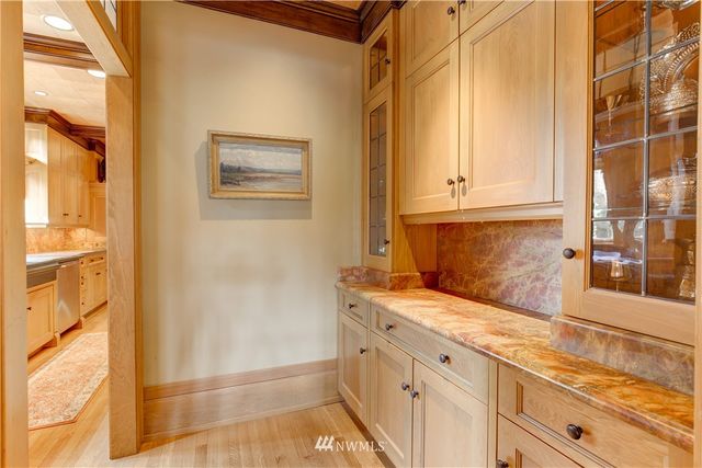 a bedroom with a large bed and a couch