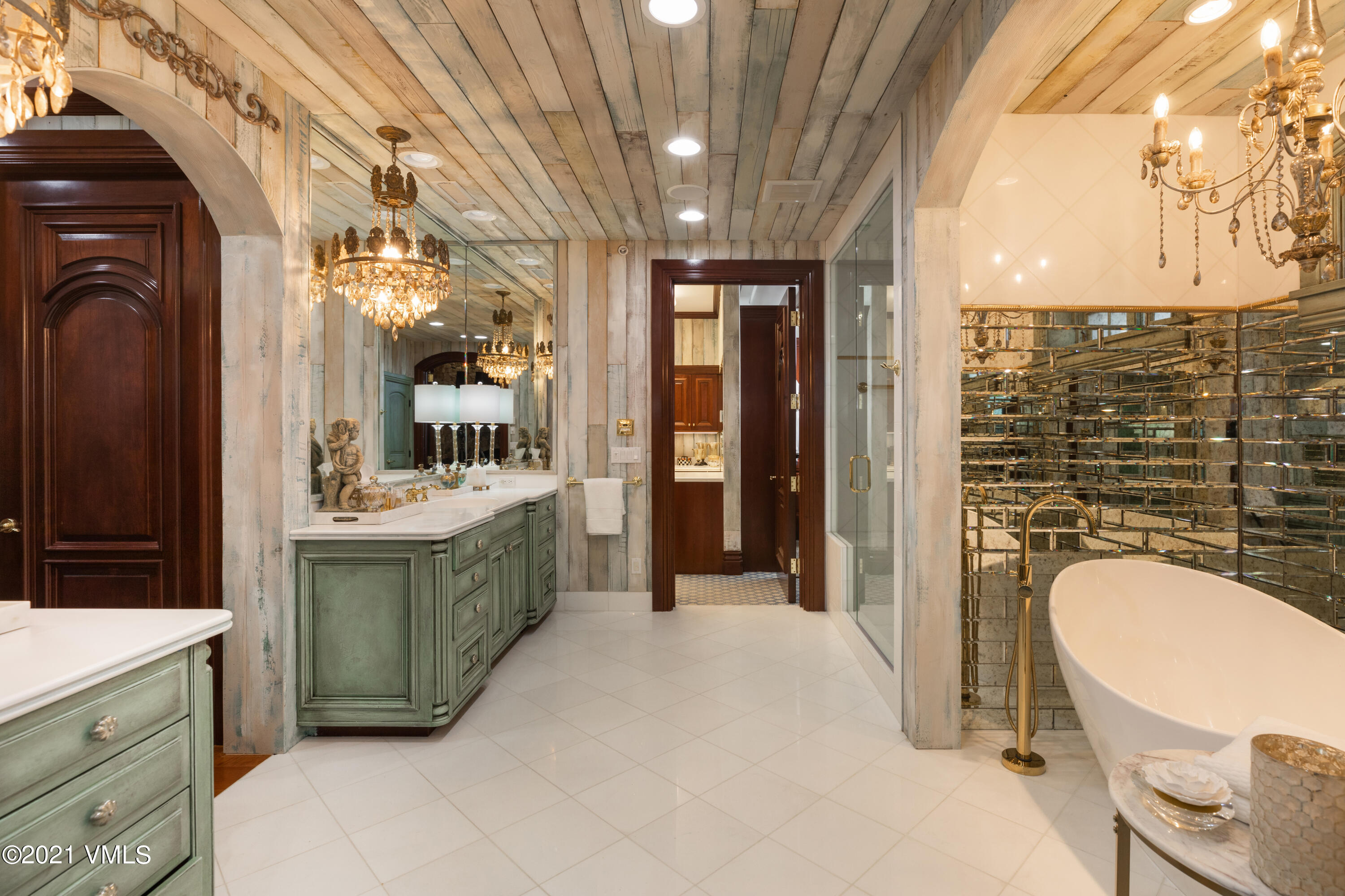 245 Casteel Ridge Edwards, CO 81632 - Photo 16 of 21 a bathroom with a granite countertop sink mirror vanity and toilet