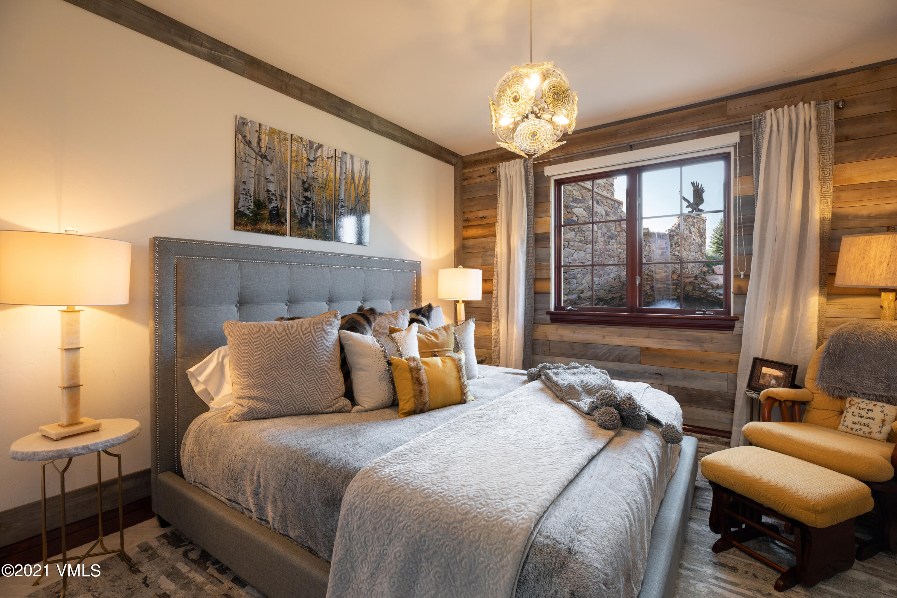 245 Casteel Ridge Edwards, CO 81632 - Photo 17 of 21 a bedroom with a bed and window