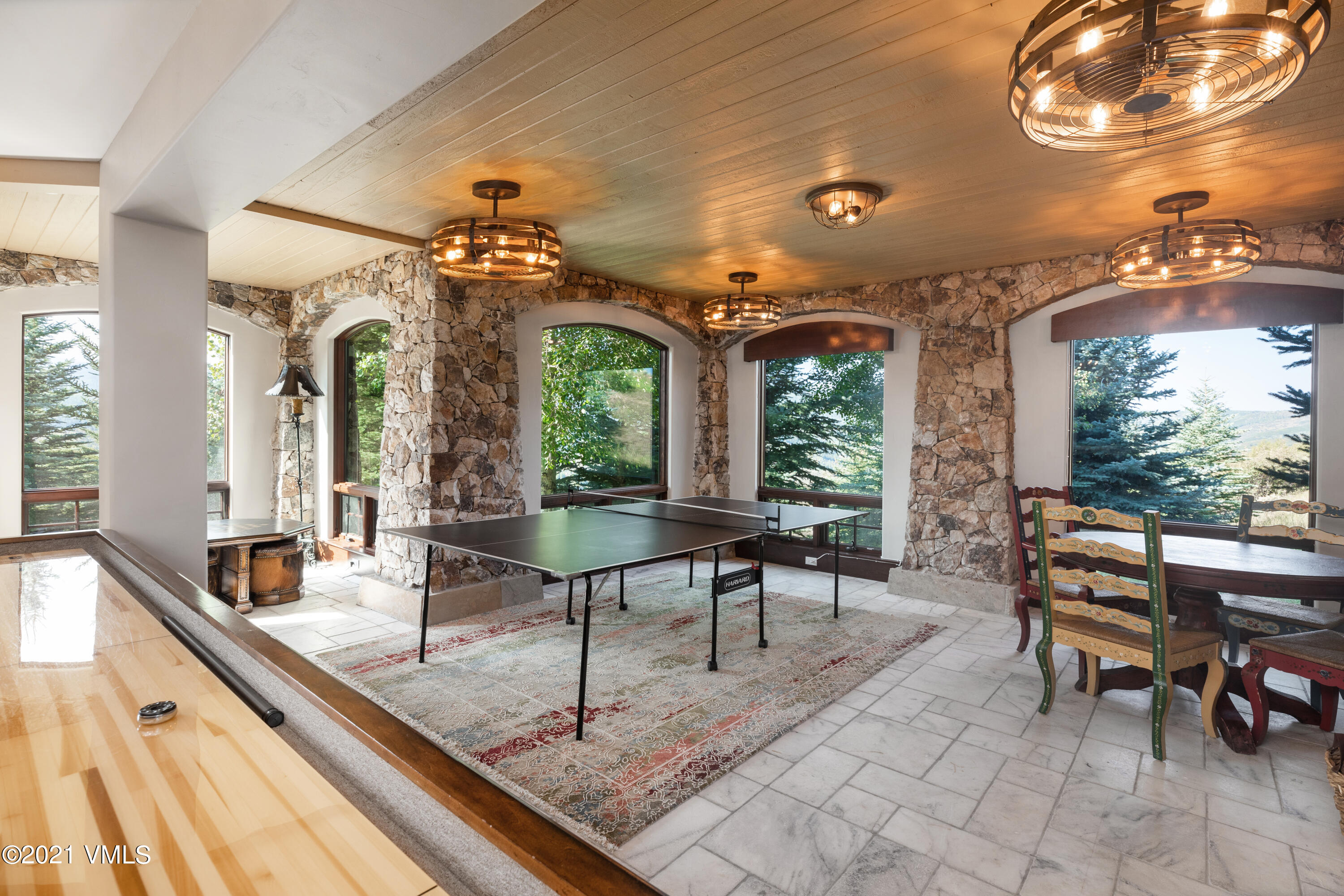 245 Casteel Ridge Edwards, CO 81632 - Photo 18 of 21 a living room with furniture and a large window