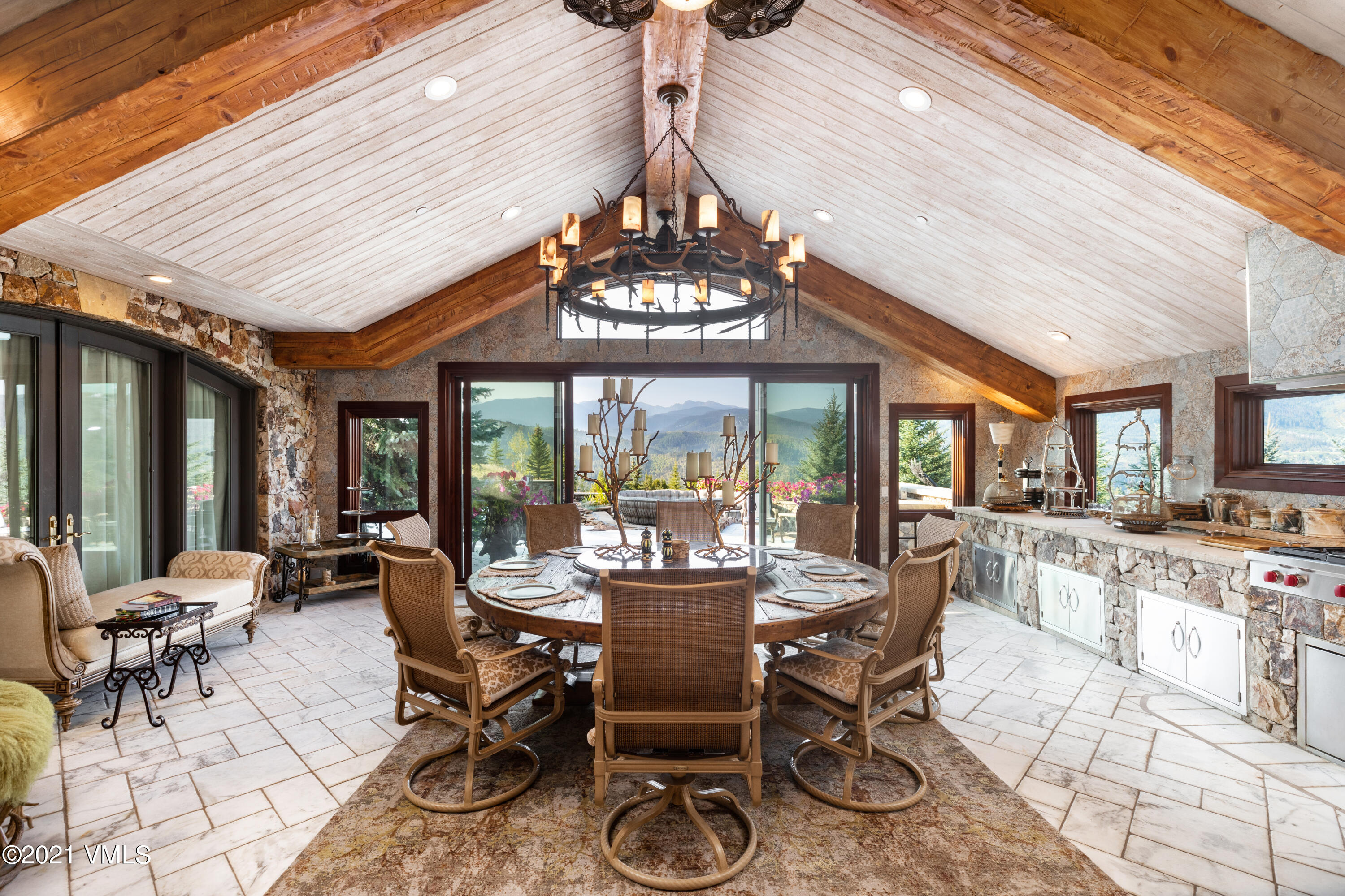 245 Casteel Ridge Edwards, CO 81632 - Photo 10 of 21 a view of a dining room with furniture window and outside view