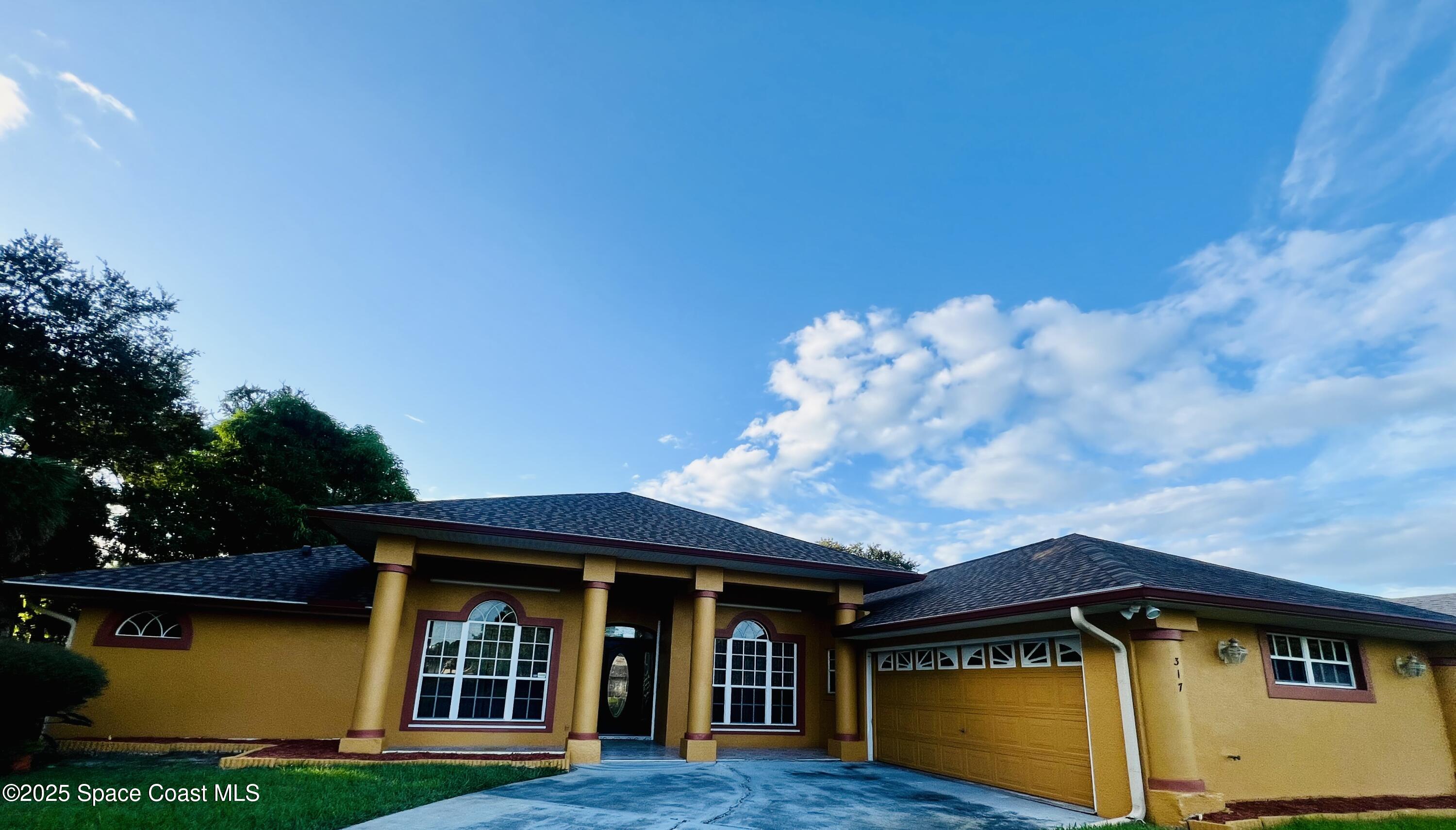 317 Lanack Road Southeast Palm Bay, FL 32909 - Photo 4 of 37 a view of a house with pool
