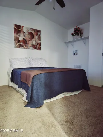 a kitchen with stainless steel appliances granite countertop a refrigerator a stove a microwave and a refrigerator