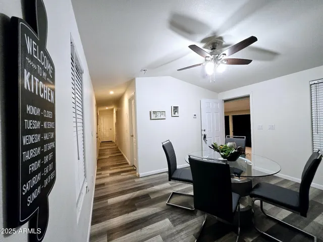 a view of a backyard with large trees