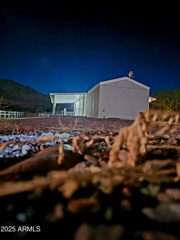 a view of a house with a porch