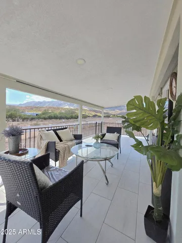 a view of an ocean and a mountain