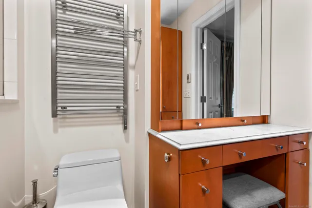 a bathroom with a tub and sink