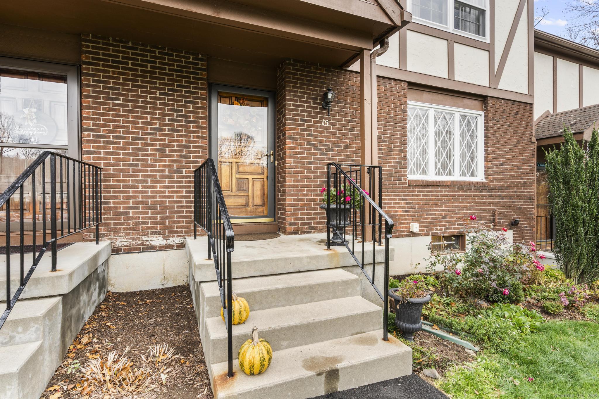 15 Derbyshire, Unit 15 Derby, CT 06418 - Photo 2 of 39 a view of front door of house with stairs