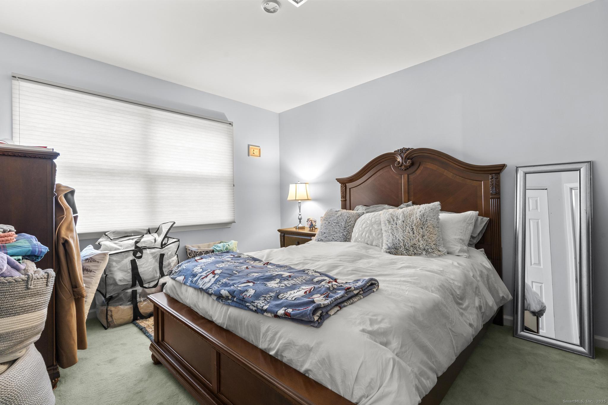 15 Derbyshire, Unit 15 Derby, CT 06418 - Photo 22 of 39 a bedroom with a bed and window