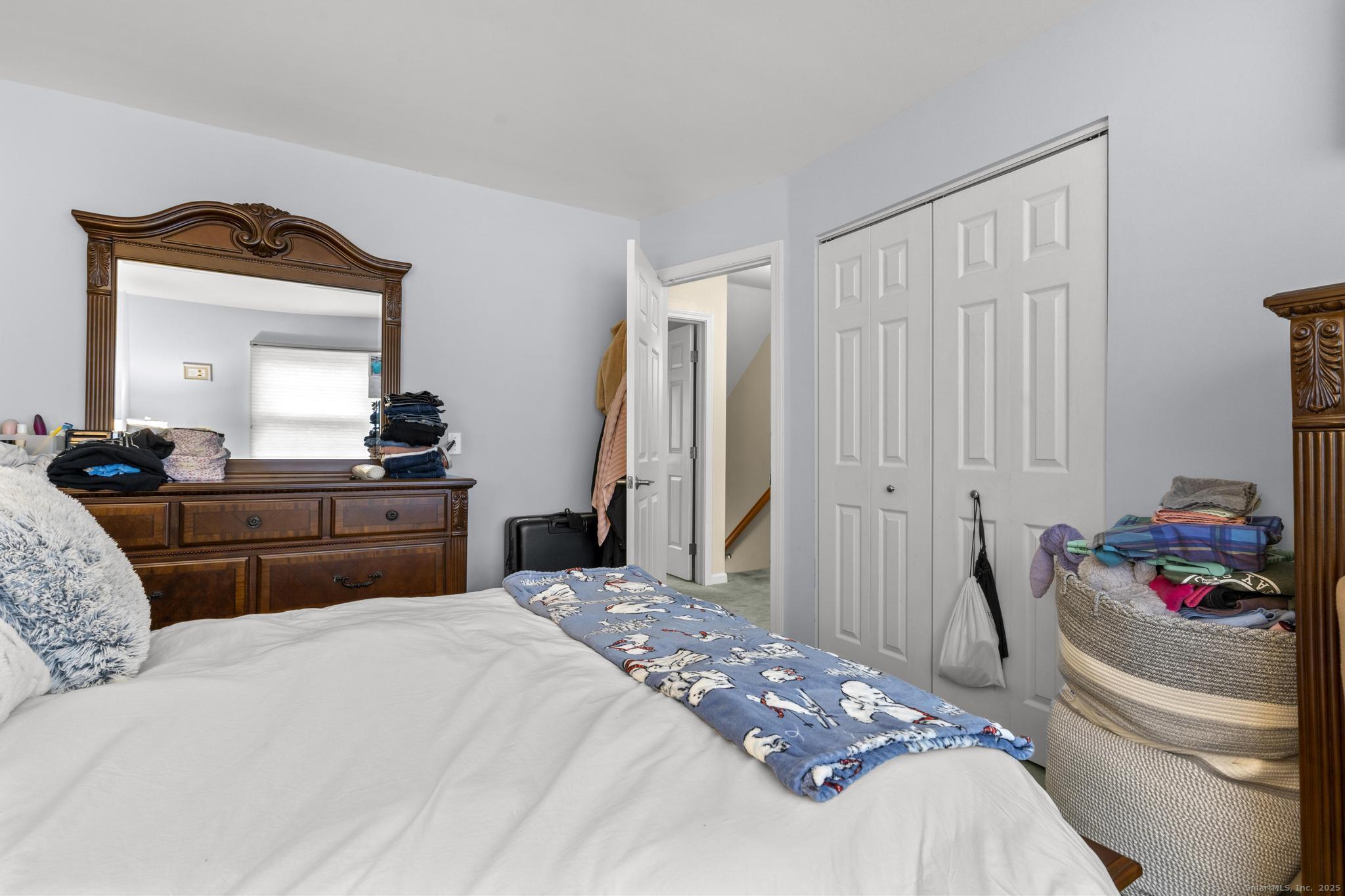 15 Derbyshire, Unit 15 Derby, CT 06418 - Photo 23 of 39 a bedroom with a bed and a dresser