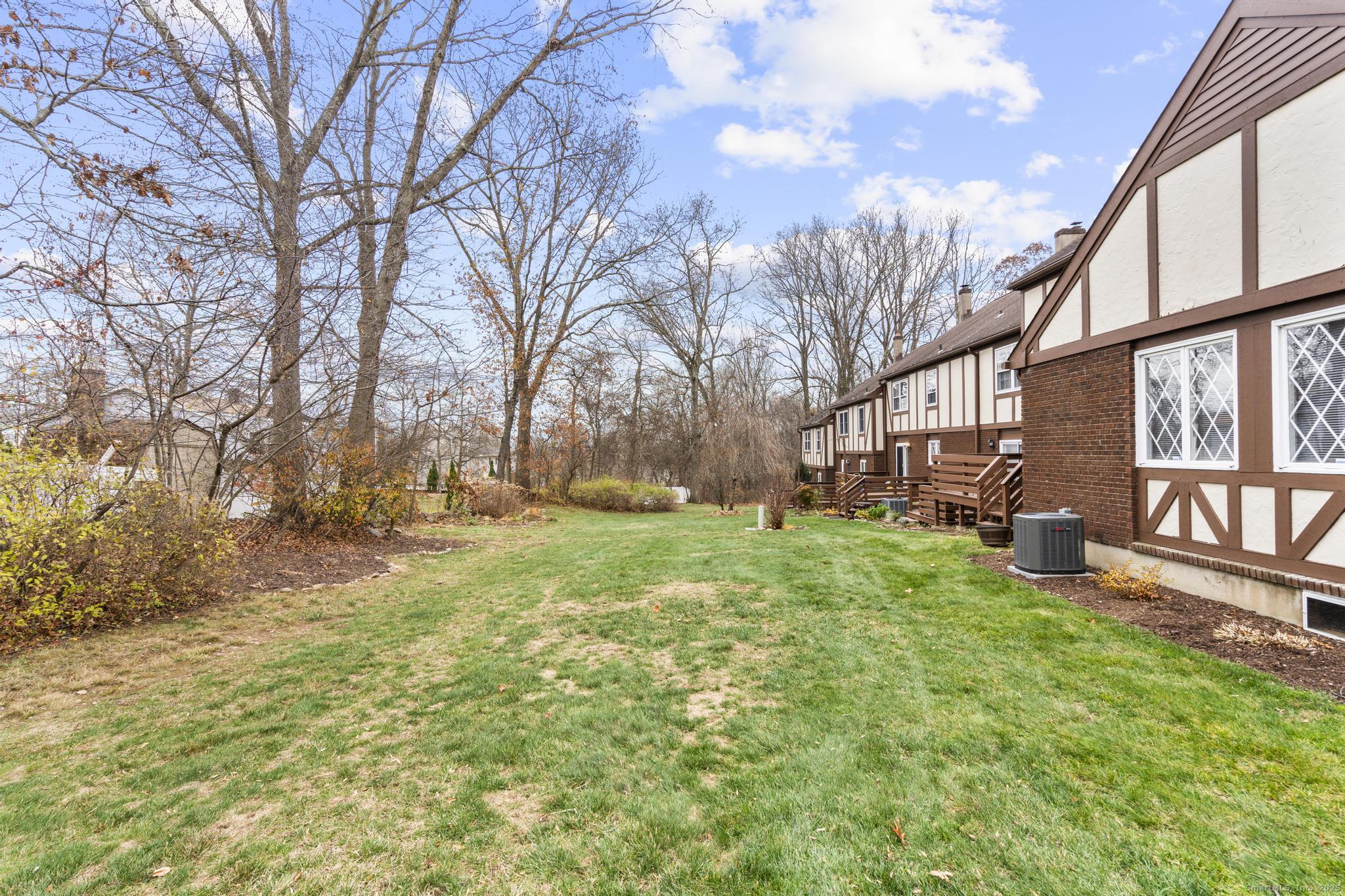 15 Derbyshire, Unit 15 Derby, CT 06418 - Photo 32 of 39 a view of backyard with tree