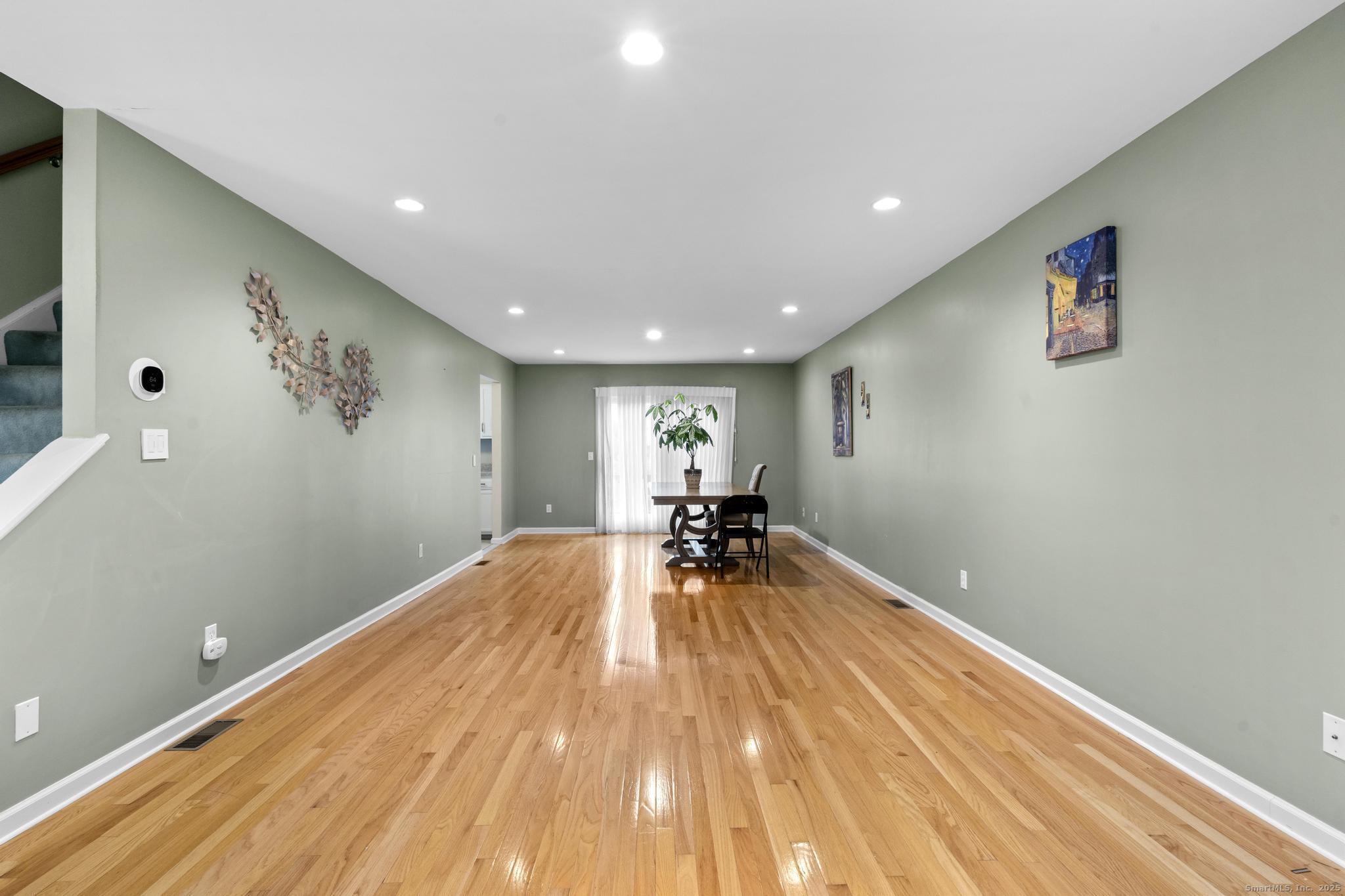15 Derbyshire, Unit 15 Derby, CT 06418 - Photo 5 of 39 a view of a room with wooden floor