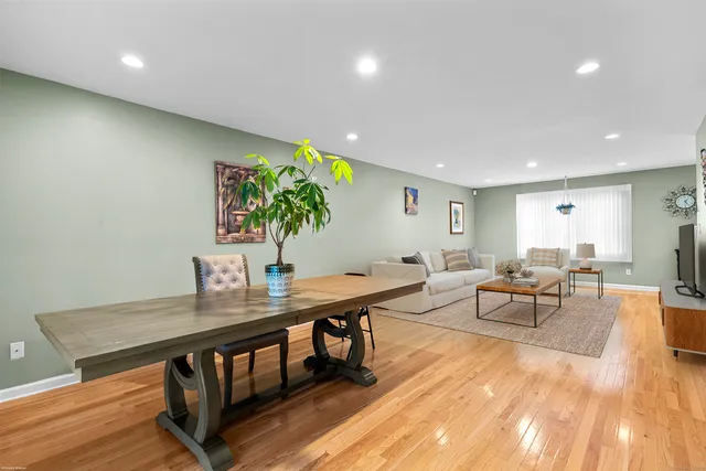 a view of a workspace with furniture